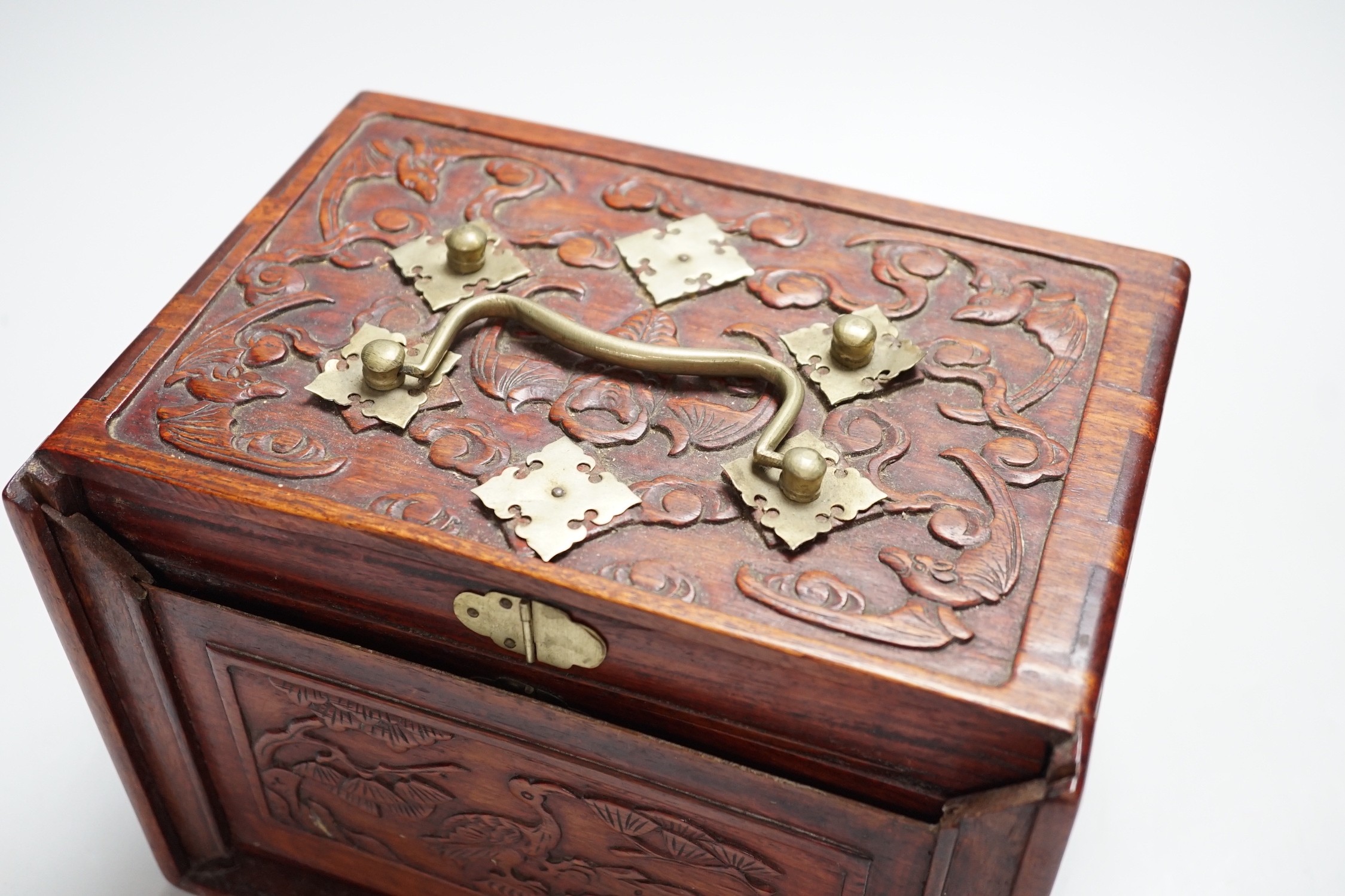 A Chinese Mah-Jong set in hardwood case with bone pieces